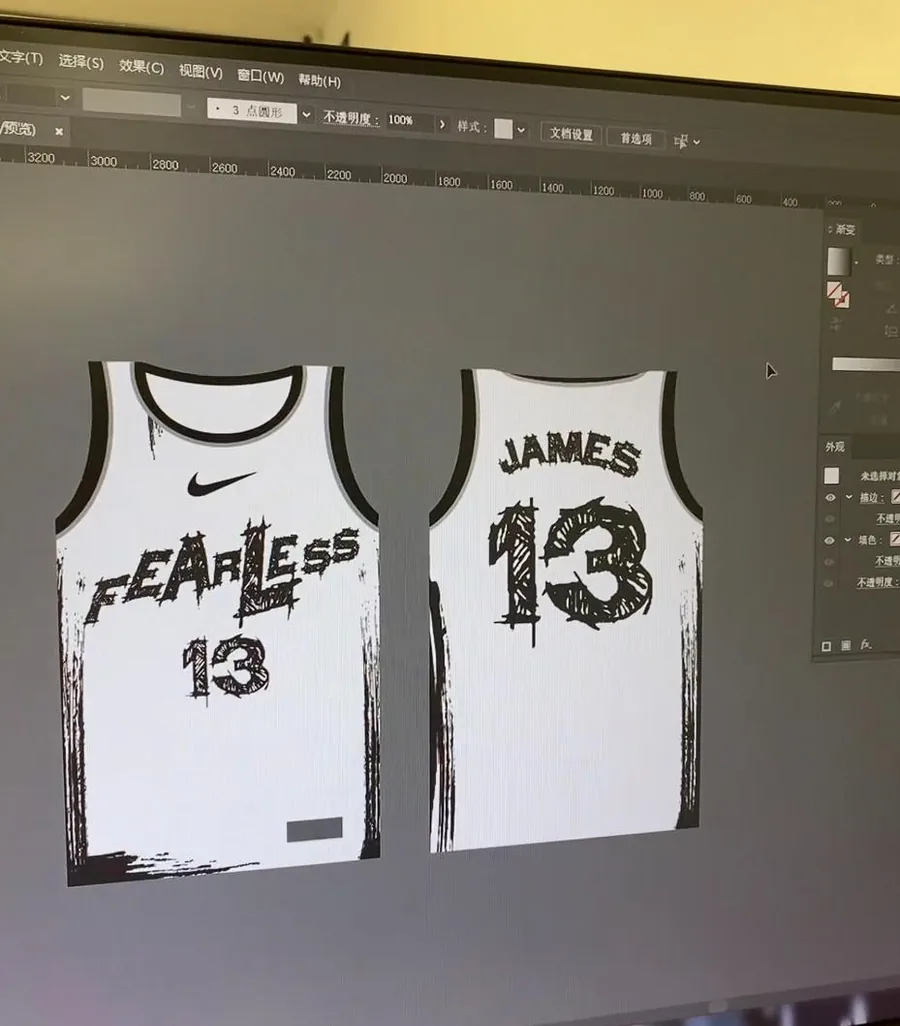 Custom basketball jersey artwork being reviewed on a computer