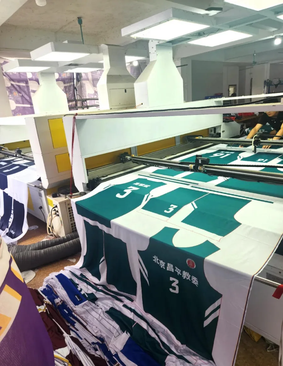 Custom jersey panels moving through a production area