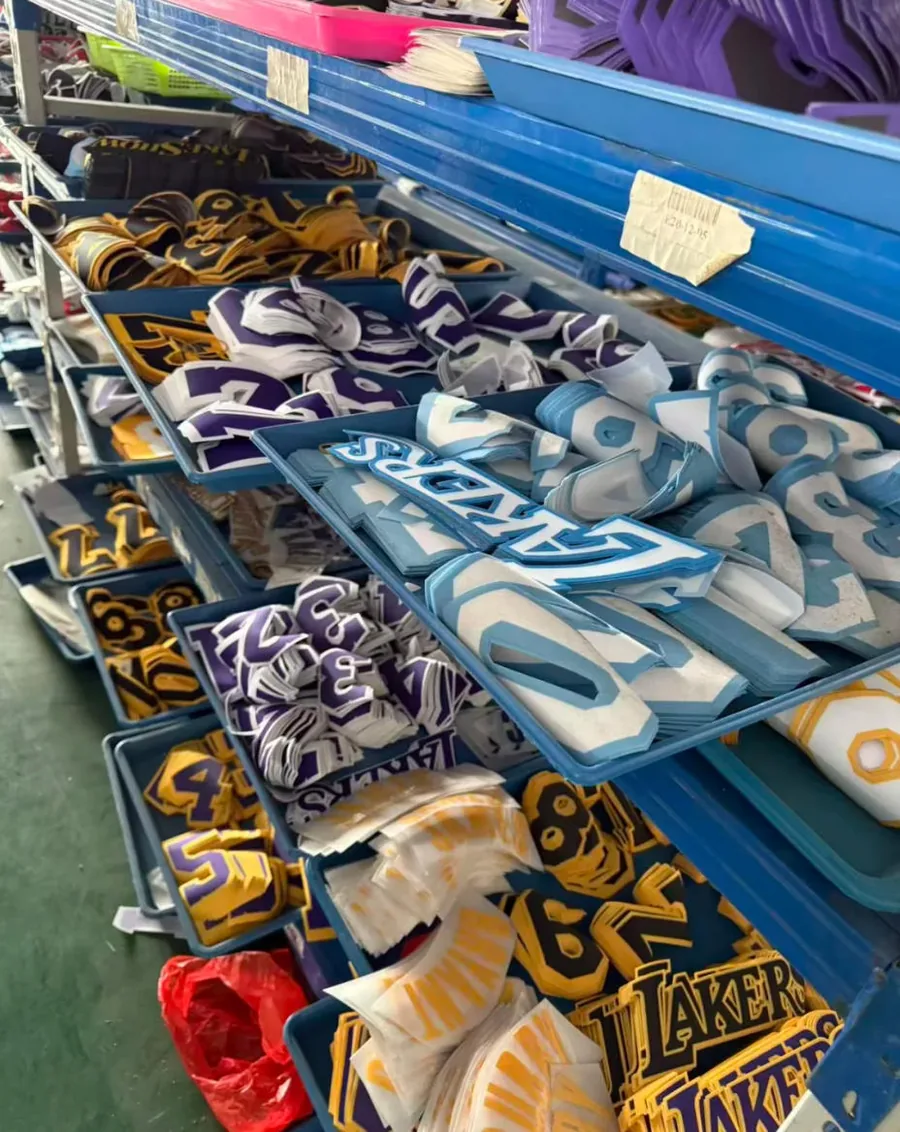 Jersey decoration components organized during order preparation